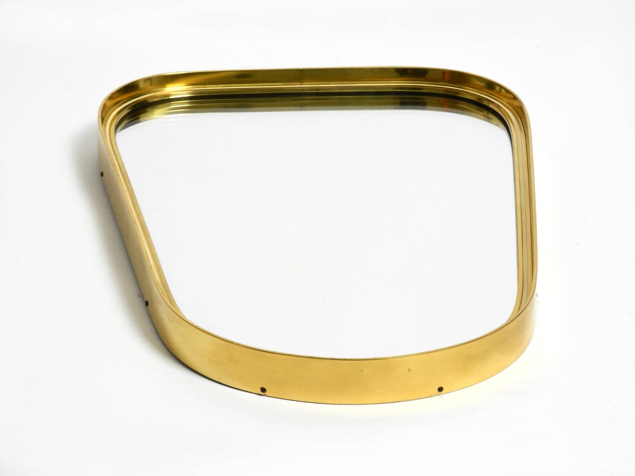 Small solid Mid Century brass wall mirror by Münchener Zierspiegel