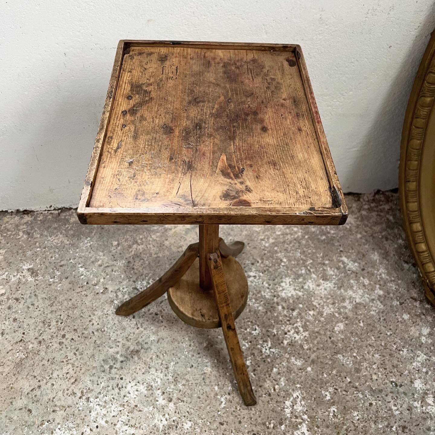 Old primitive wooden tripod pedestal table