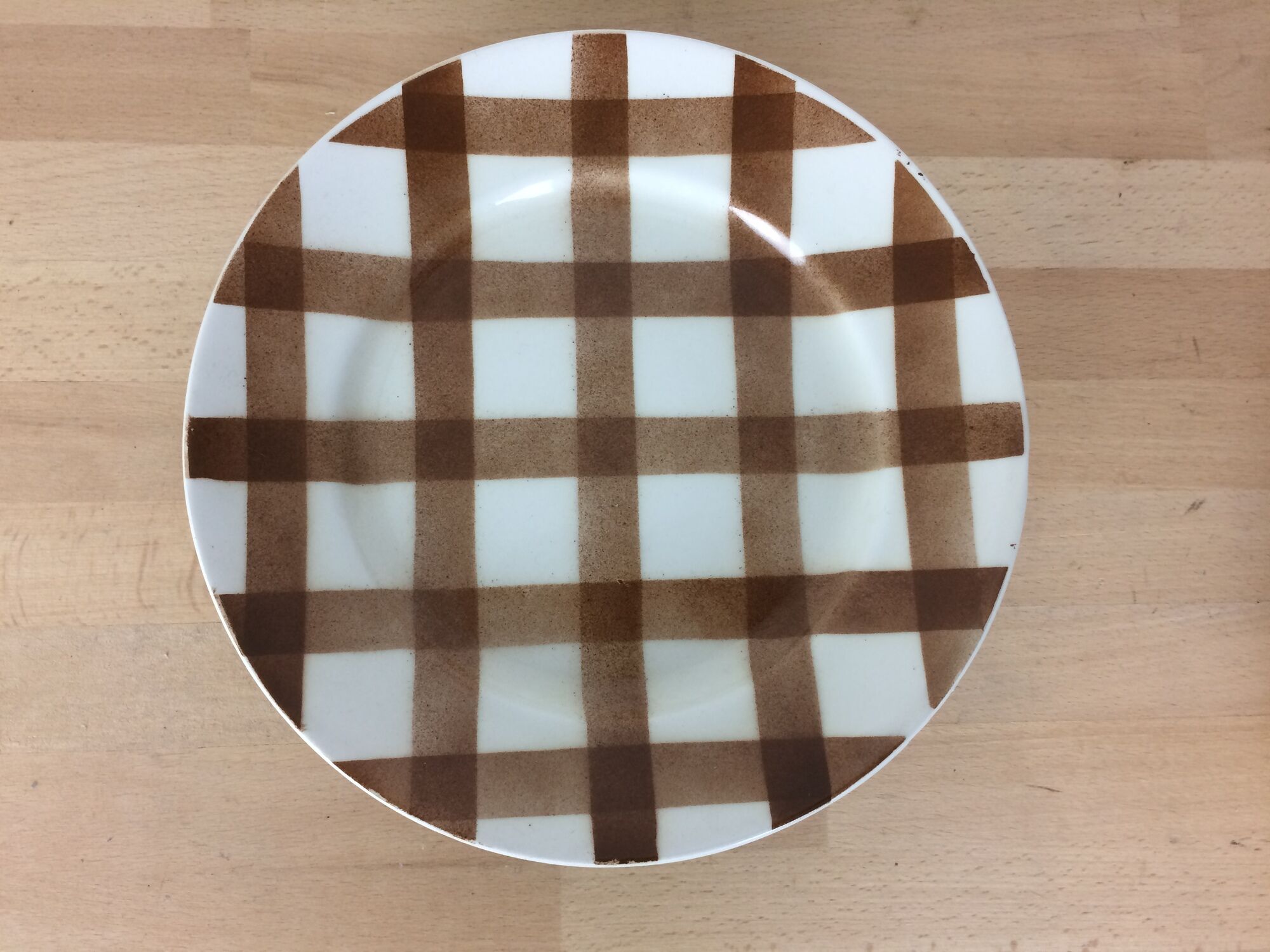 10 ceramic "nappe" plates from the Moulin des Loups, brown