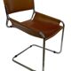 vintage dining room chair in cognac leather and chrome 1970s Italy