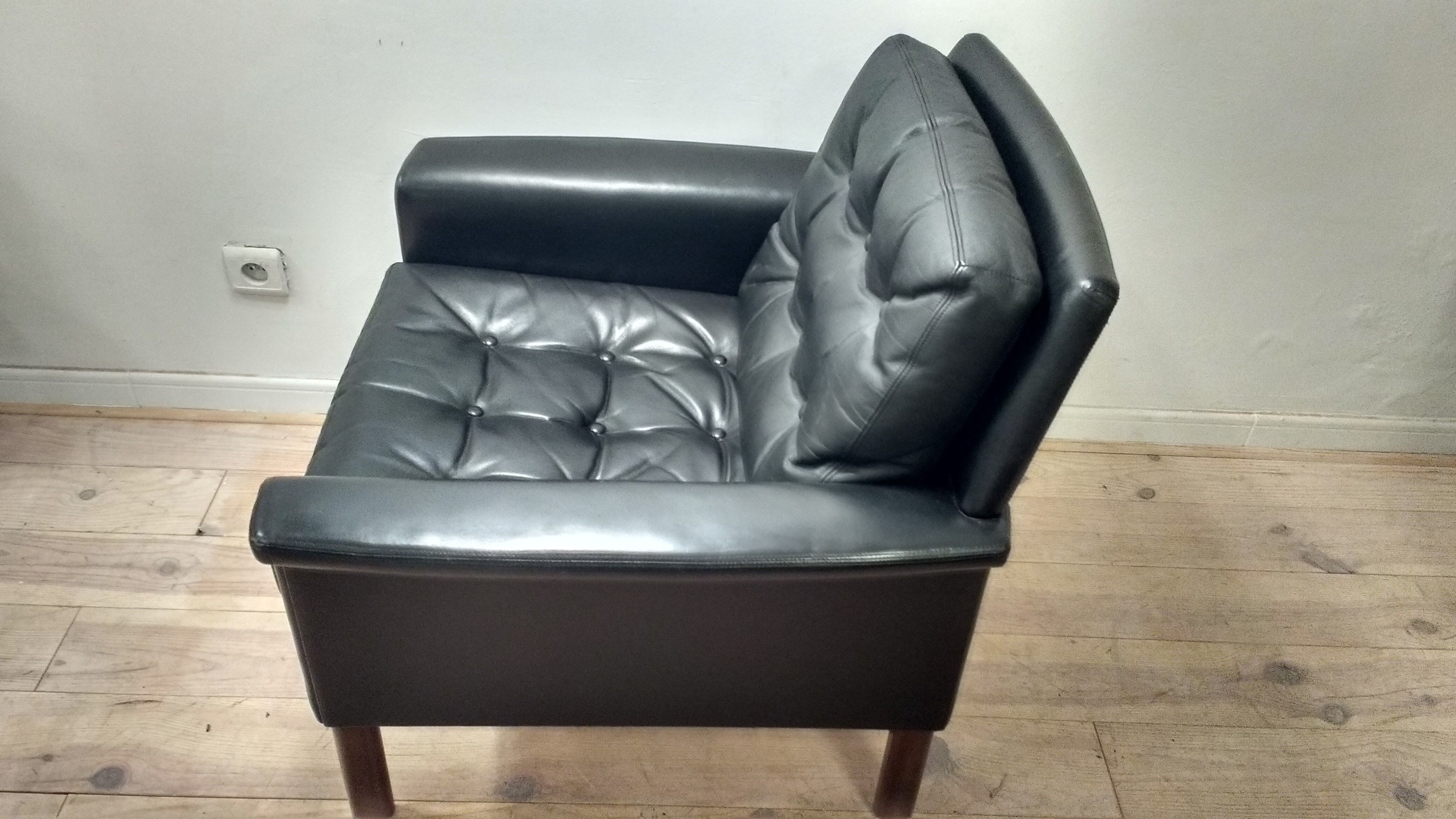 Pair of leather Danish chairs