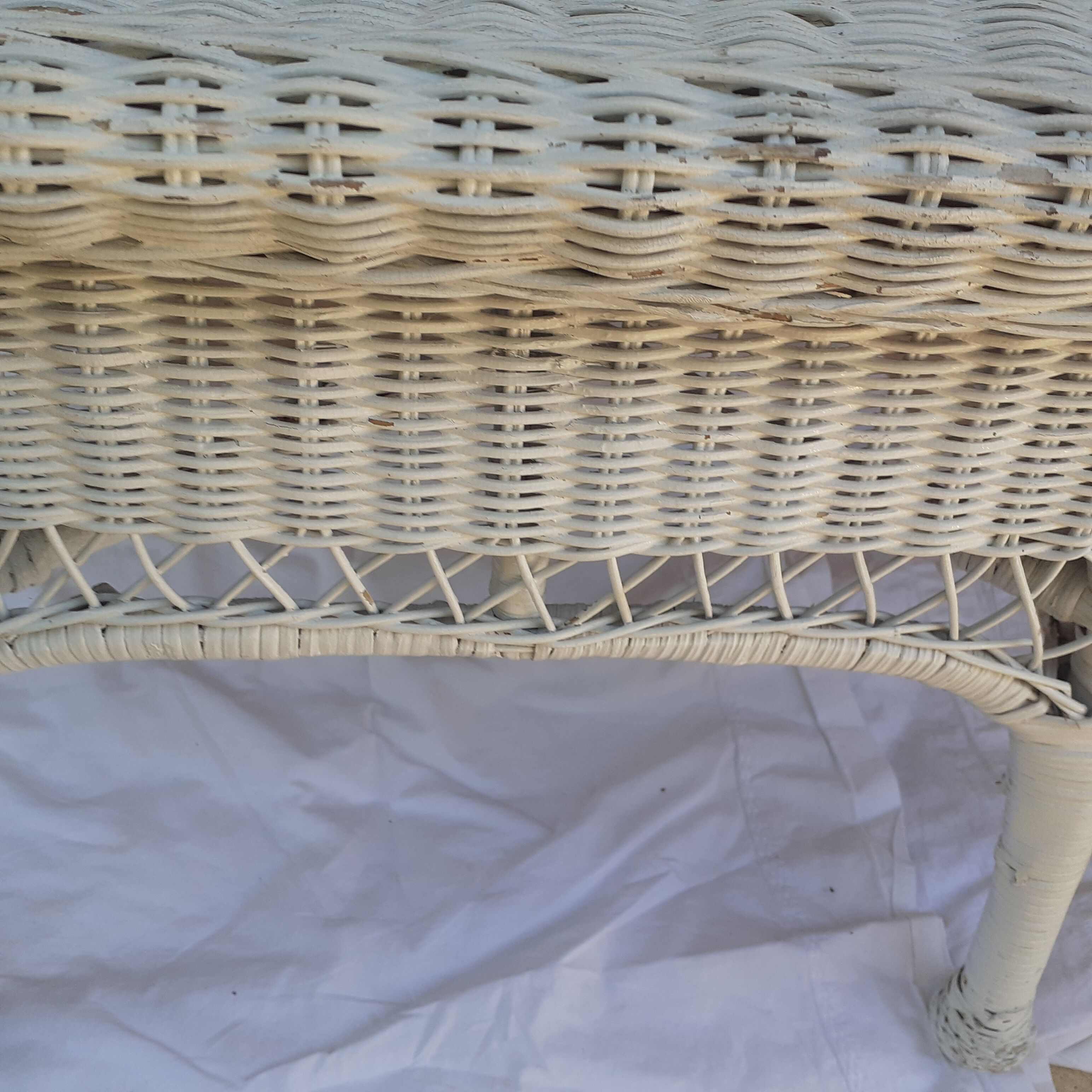 Vintage white rattan coffee table.