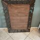 Antique mirror in openwork carved wood