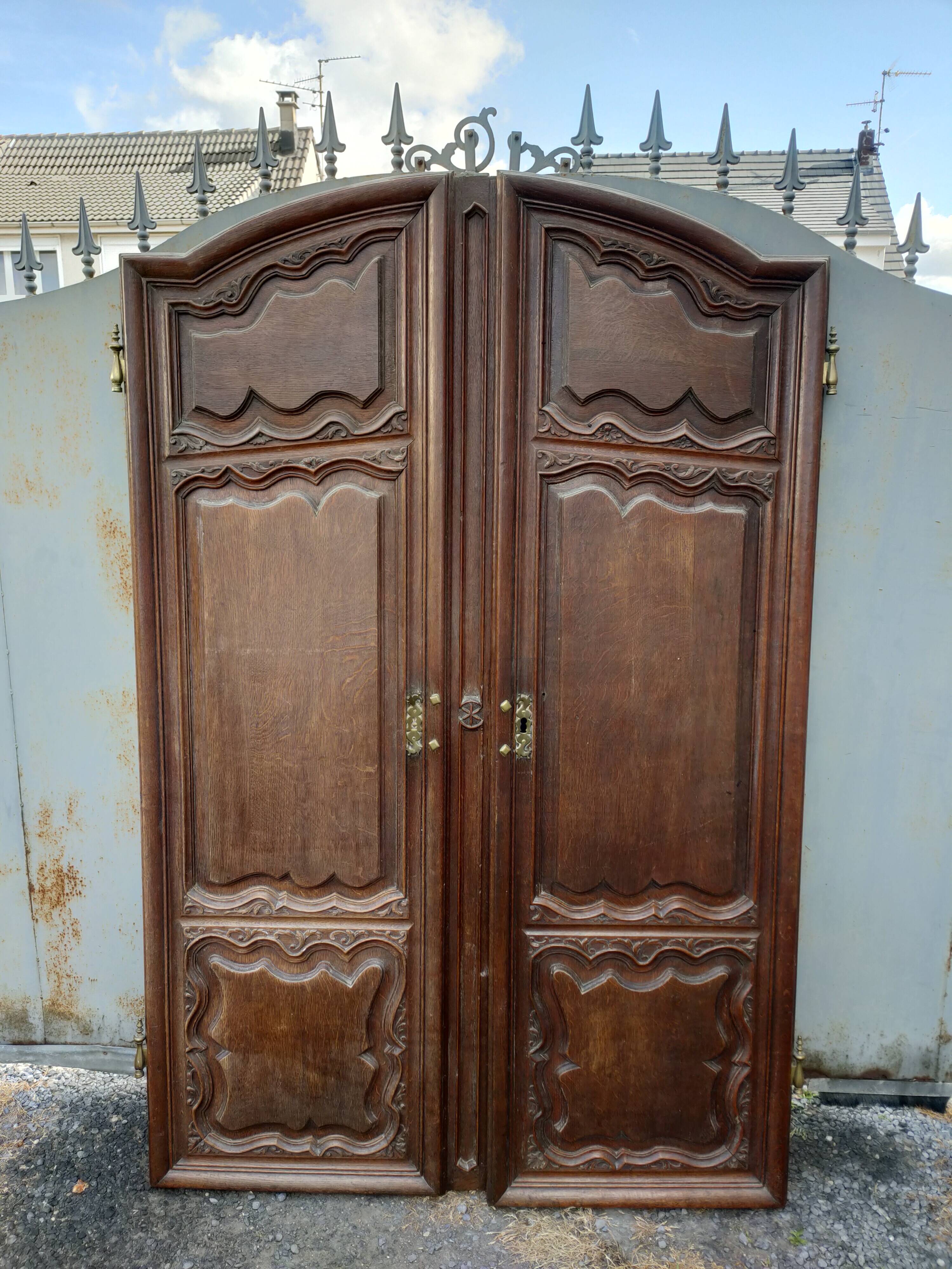 Pair of antique oak wardrobe doors