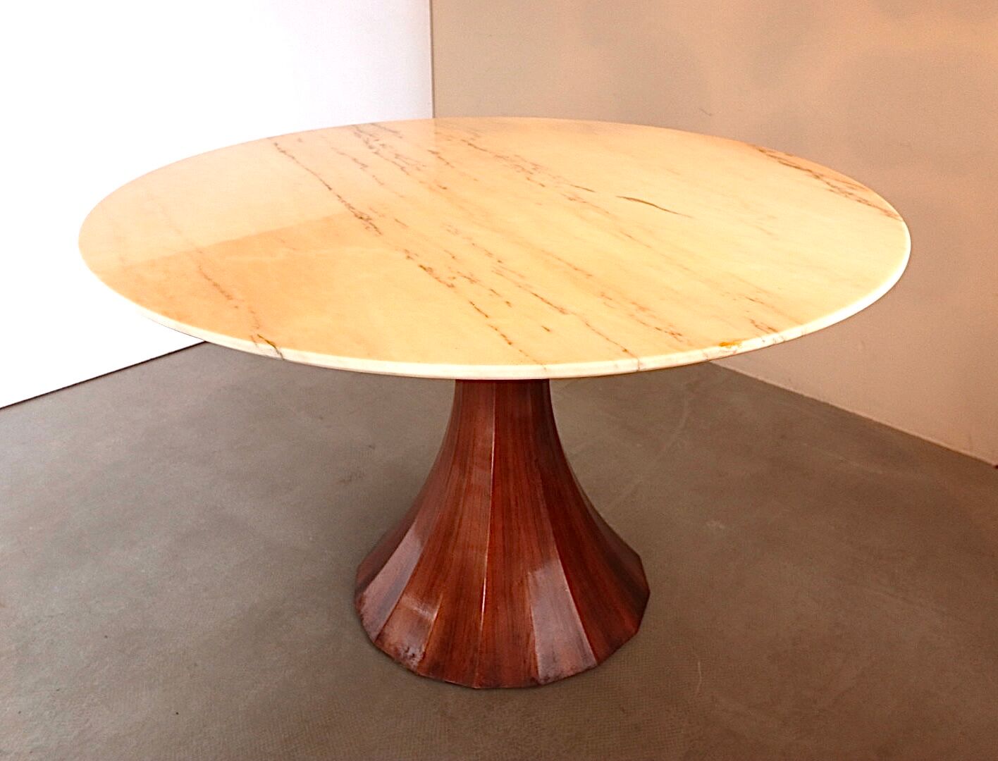 Marble and rosewood round dining table