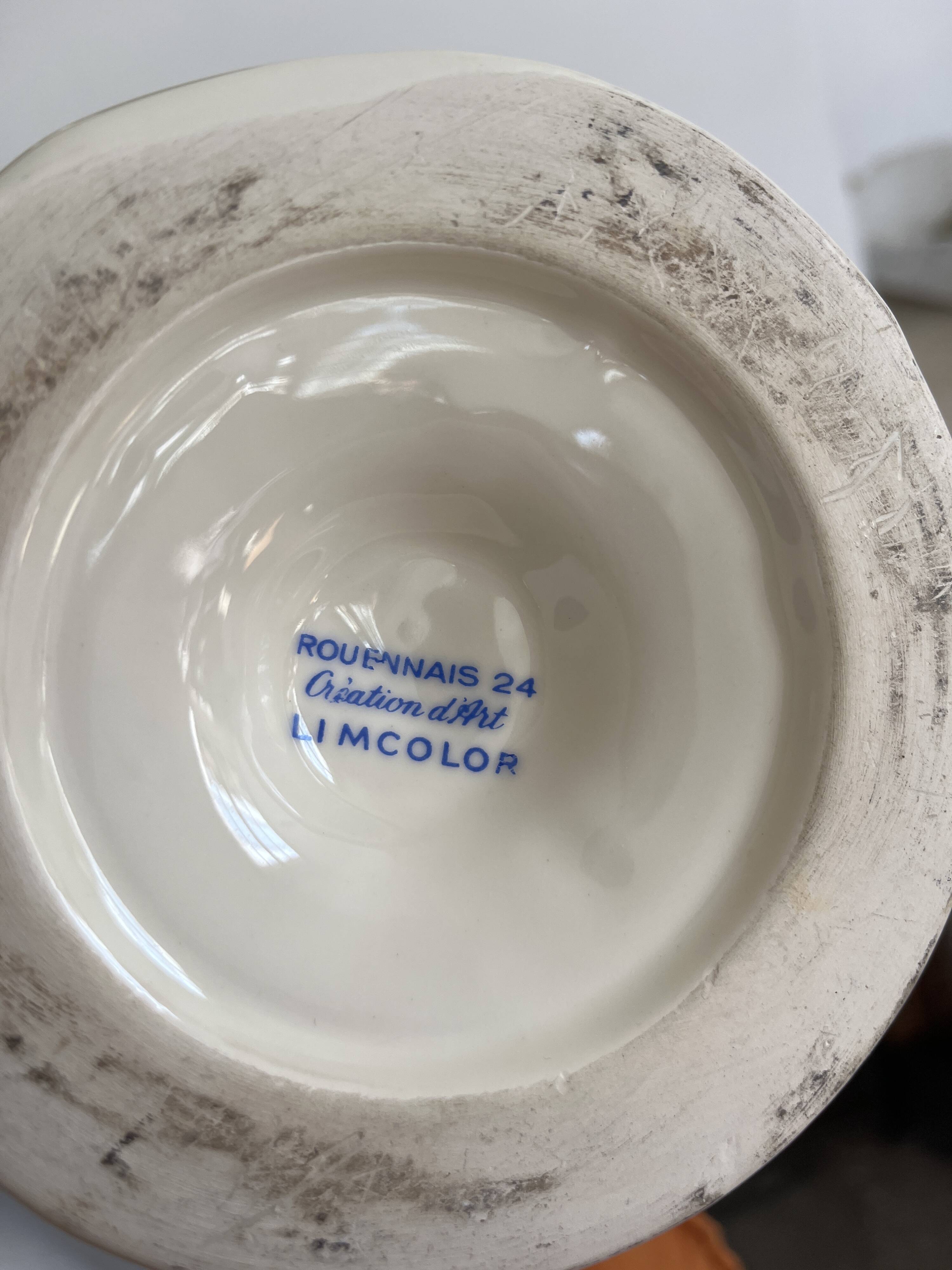 Baluster vase with handles in porcelain with floral decoration.