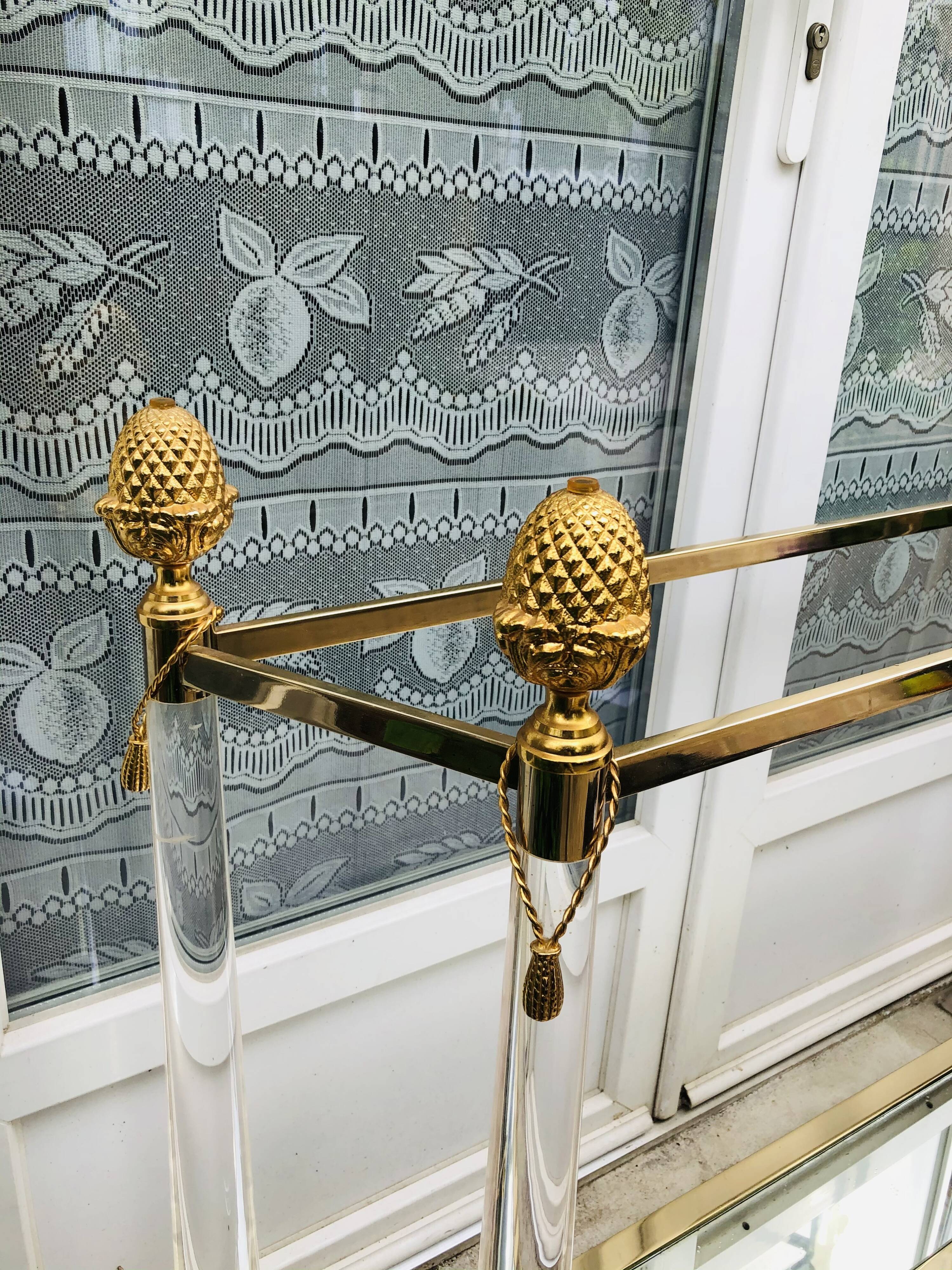 Console in Plexiglas and gold metal