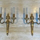 Set of 4 bronze wall lights in Louis XVI style.