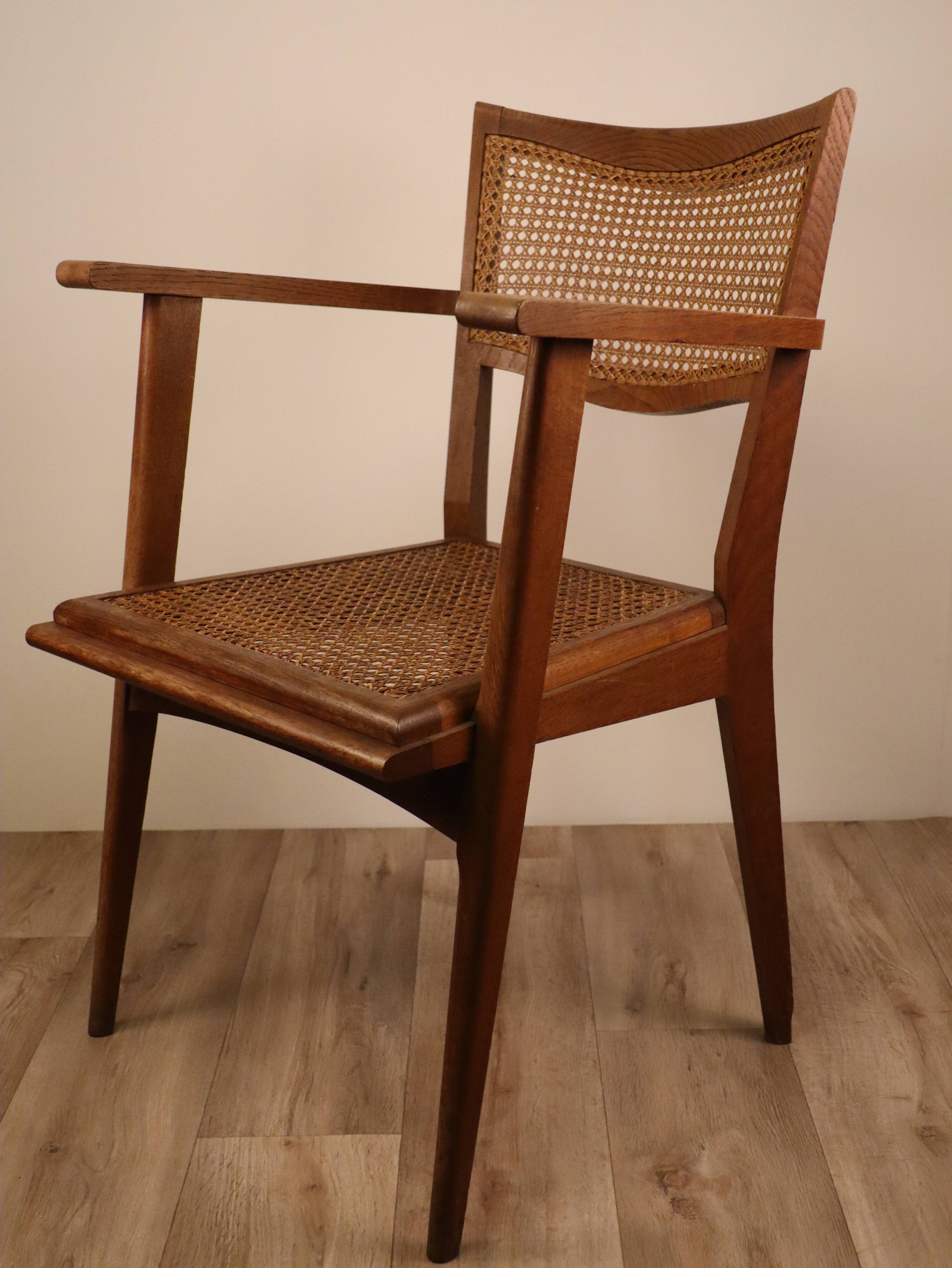Vintage wooden armchair and canning 1950