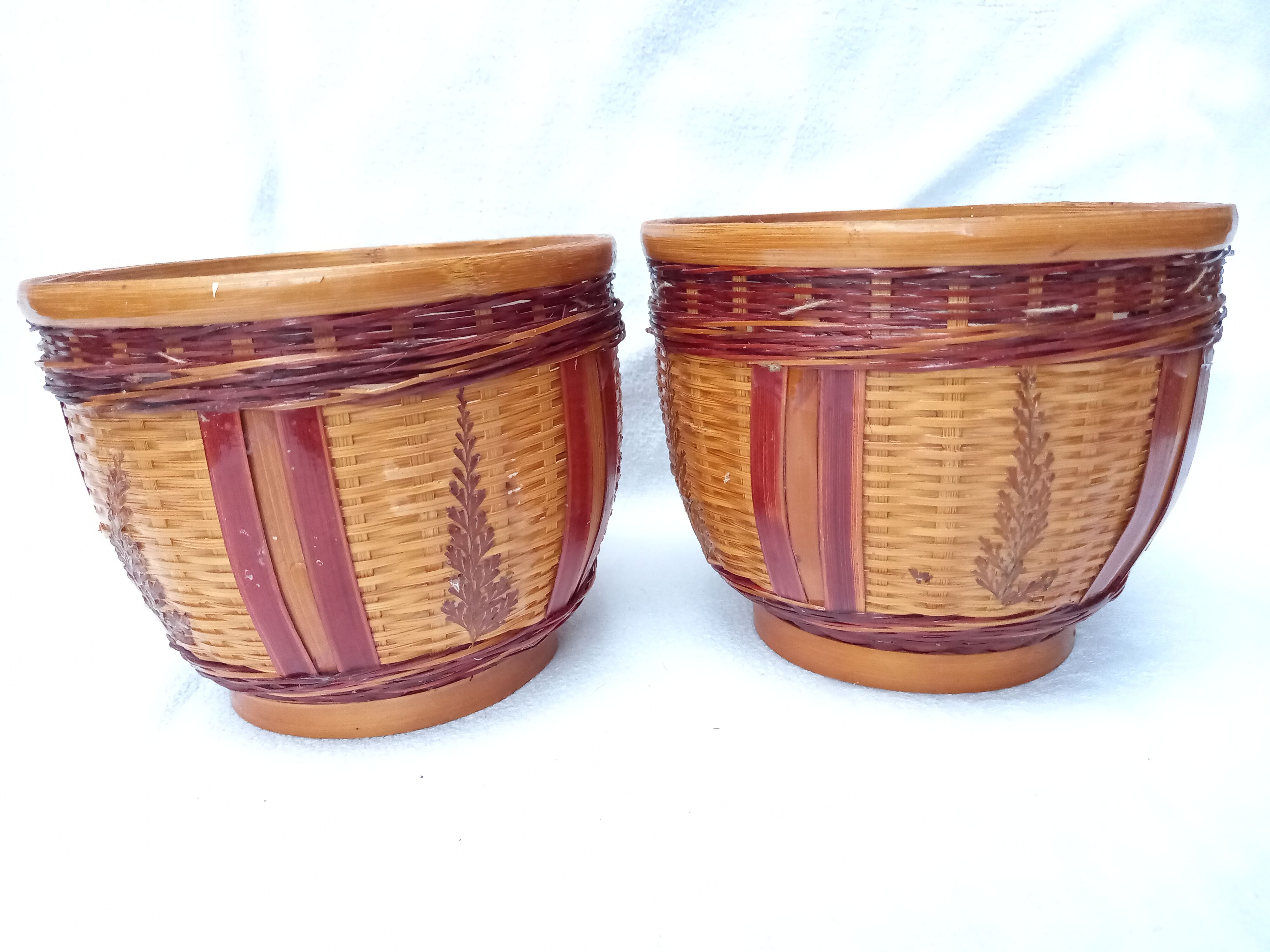 Duo of vintage braided wicker pot cover