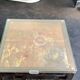 Vintage brutalist coffee table with Asian decor.