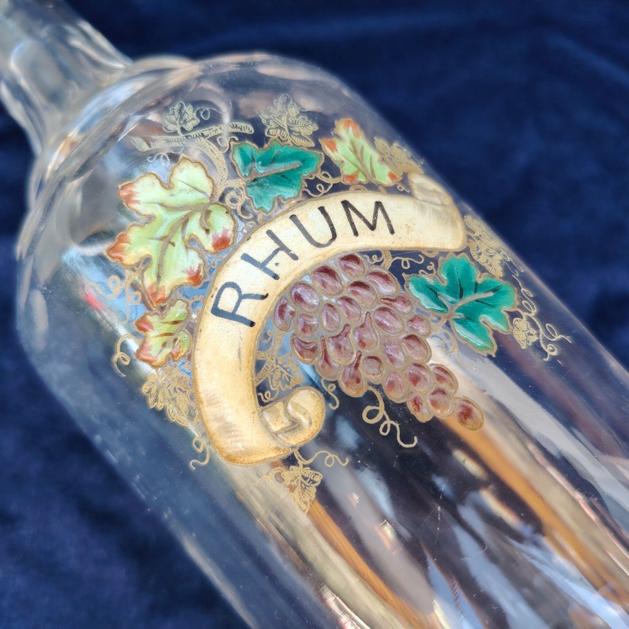 Old rum bottle, enamelled glass, vintage