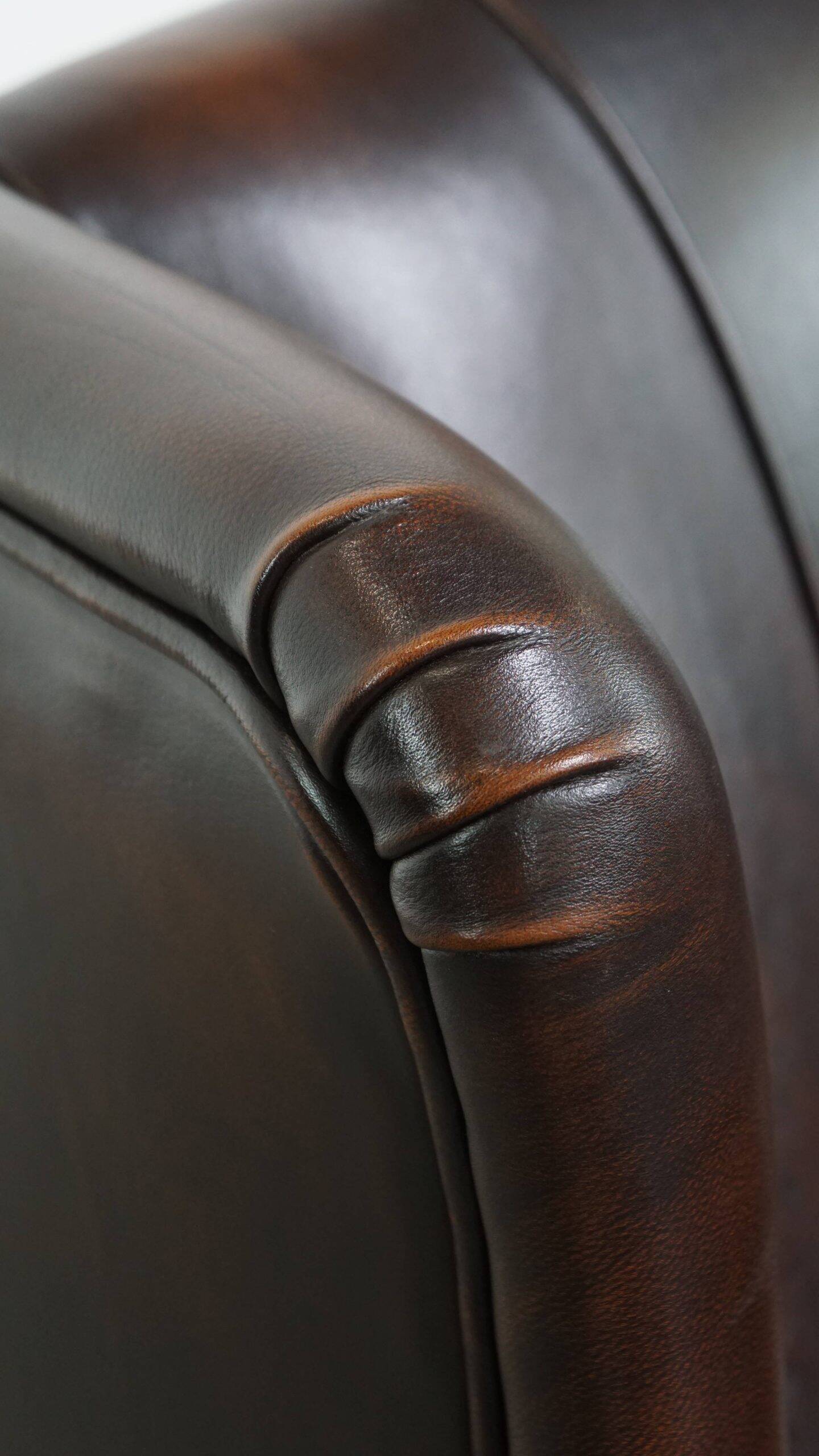 Very beautiful wing chair made of cowhide leather in English style