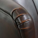 Very beautiful wing chair made of cowhide leather in English style