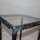 Giacometti style cast iron table, glass table