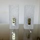 Pair of pull switch wall lights in perspex and gilded brass, France, circa 1960.