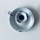 Old candle holder in white enameled metal