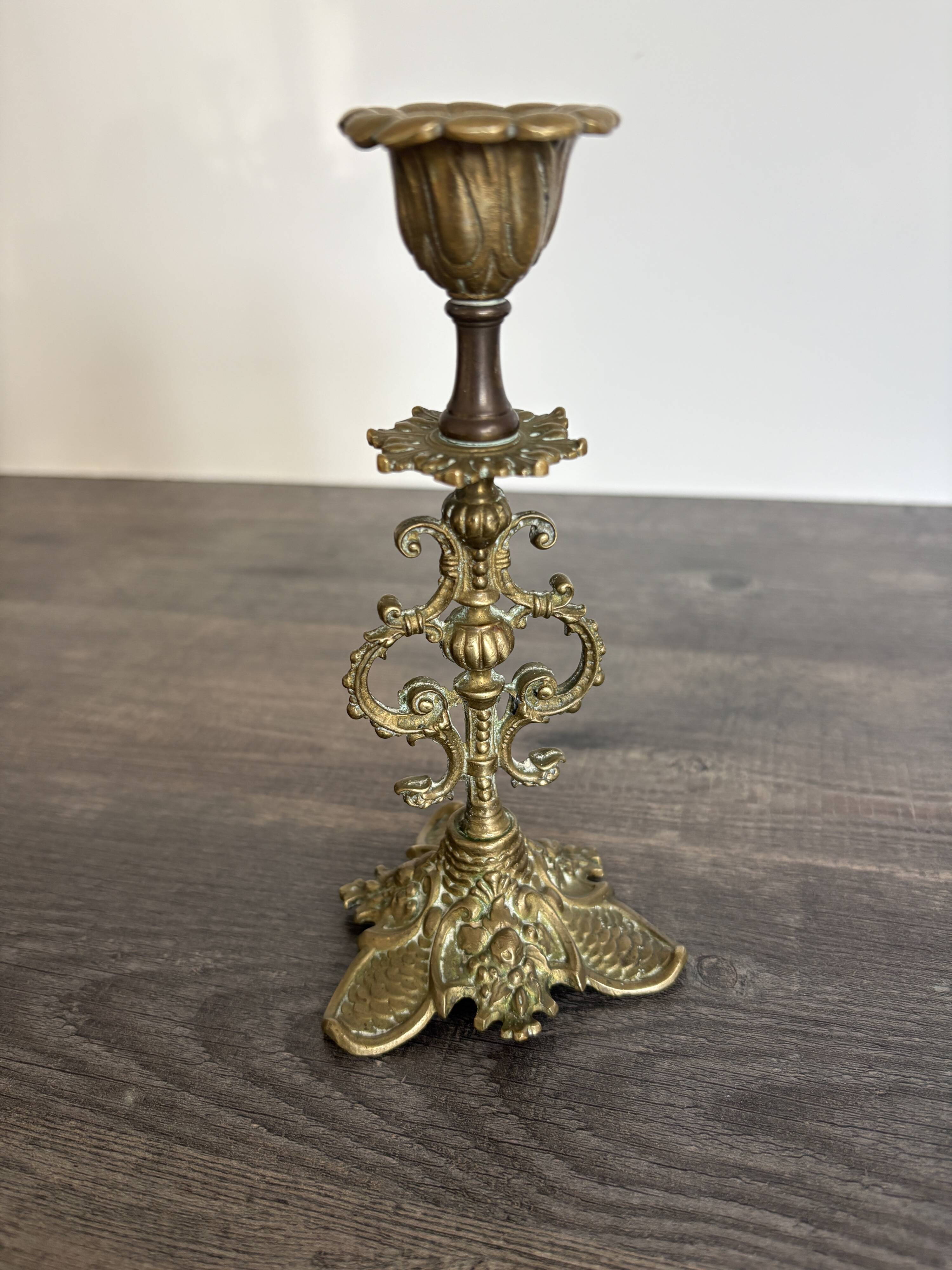 Antique chiselled bronze candlestick