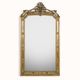 Miroir en bois doré de style néo-classique à motif corde et pompons