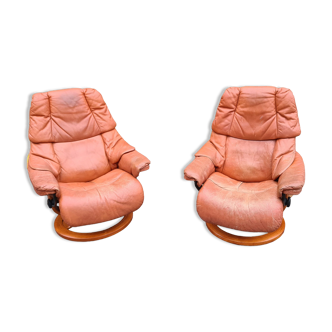 Pair of super comfortable ekornes stress-free leather swivel chairs / vintage
