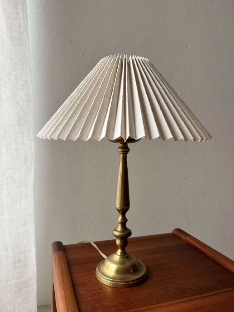 Brass table lamp with pleated shade, 1960s vintage design.