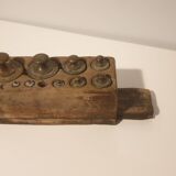 Ancient marble scale with brass weight