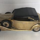 Ancient miniature metal car