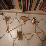Pair of gilded bronze wall lamps
