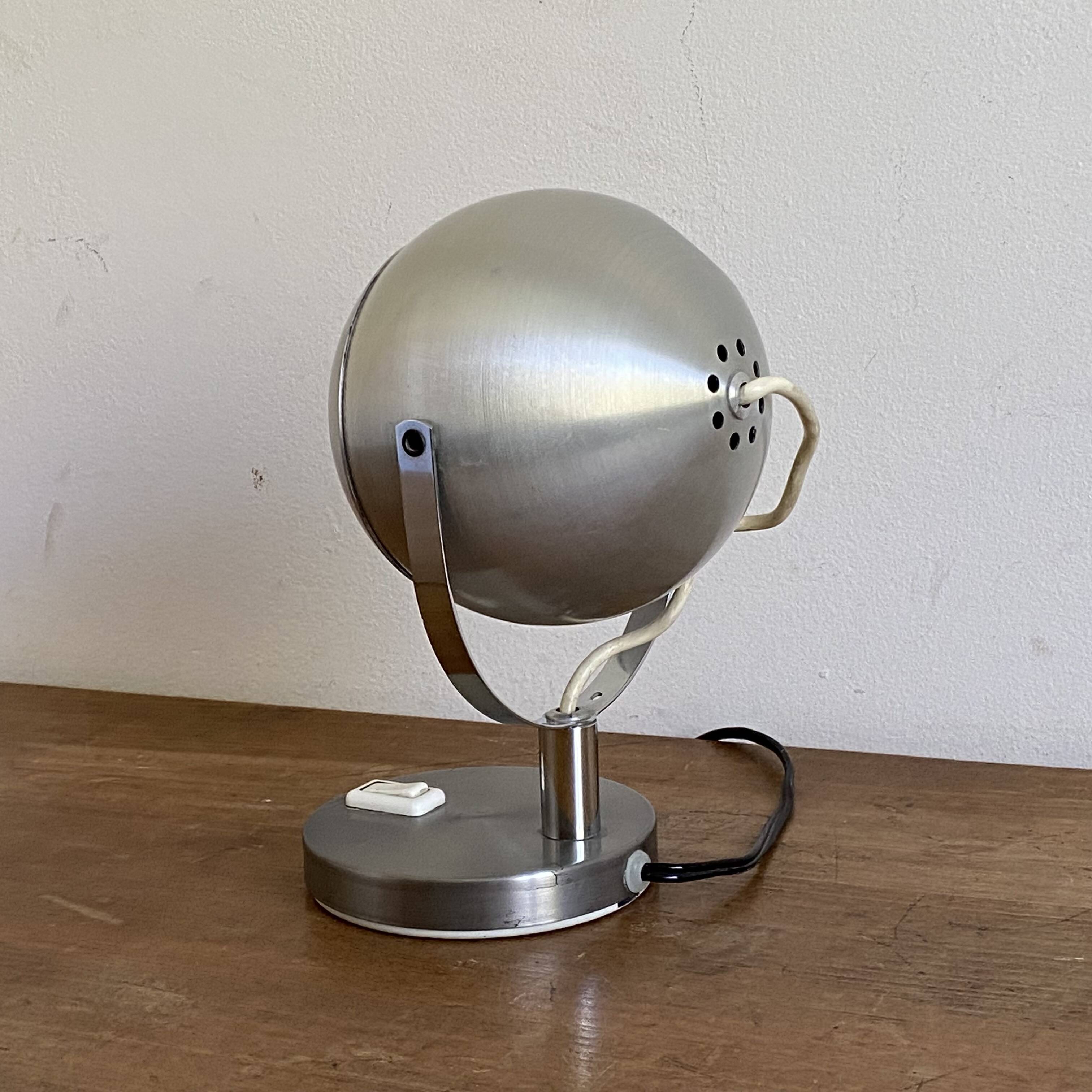 Eye ball lamp. 1970. Brushed stainless steel.