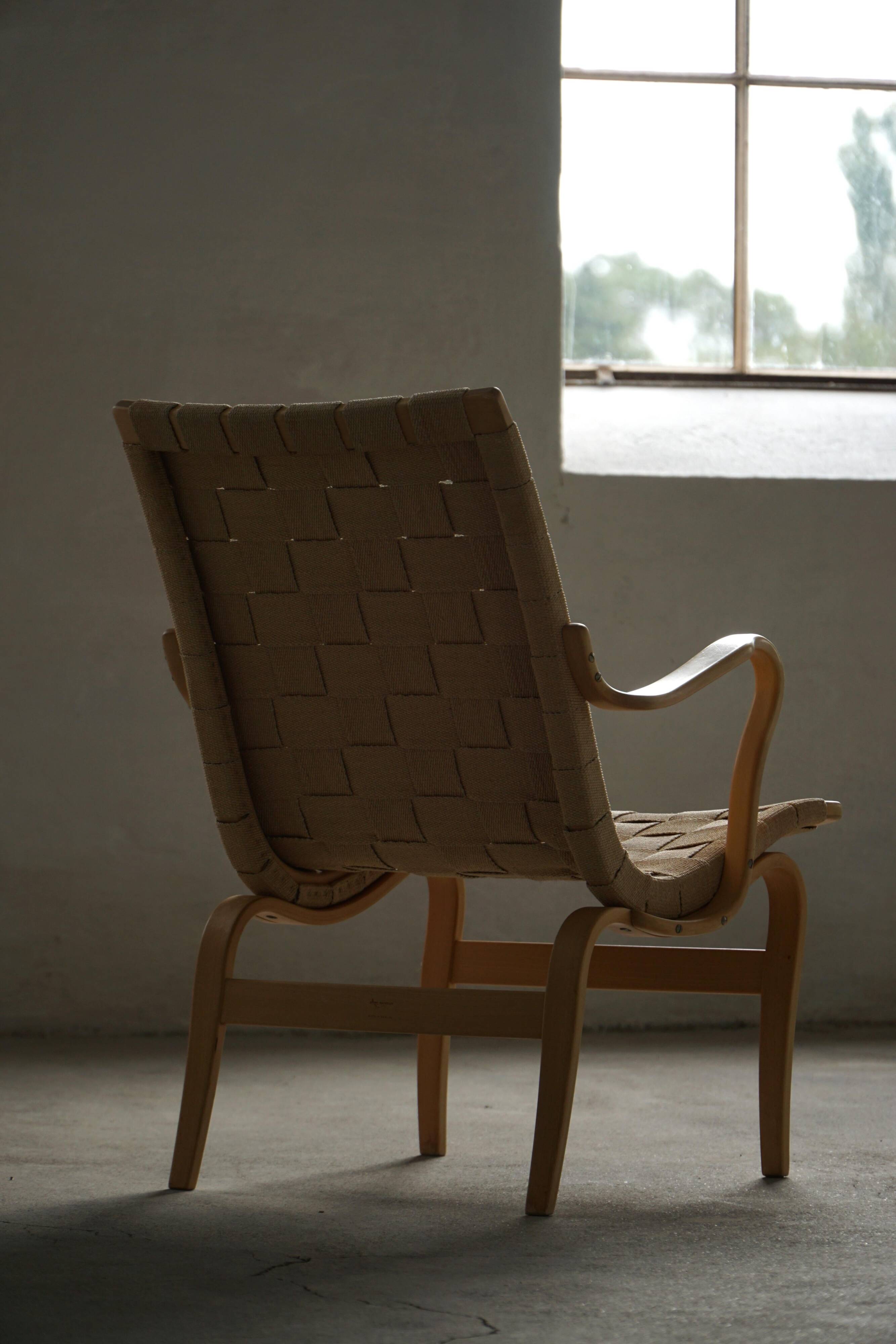 Pair of Swedish armchairs from the mid-century by Bruno Mathsson, model "Eva", 1960s.