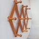 Vintage accordion wall coat rack