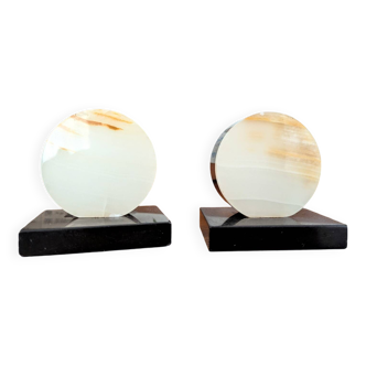 Duo of art deco bookends in black marble and onyx