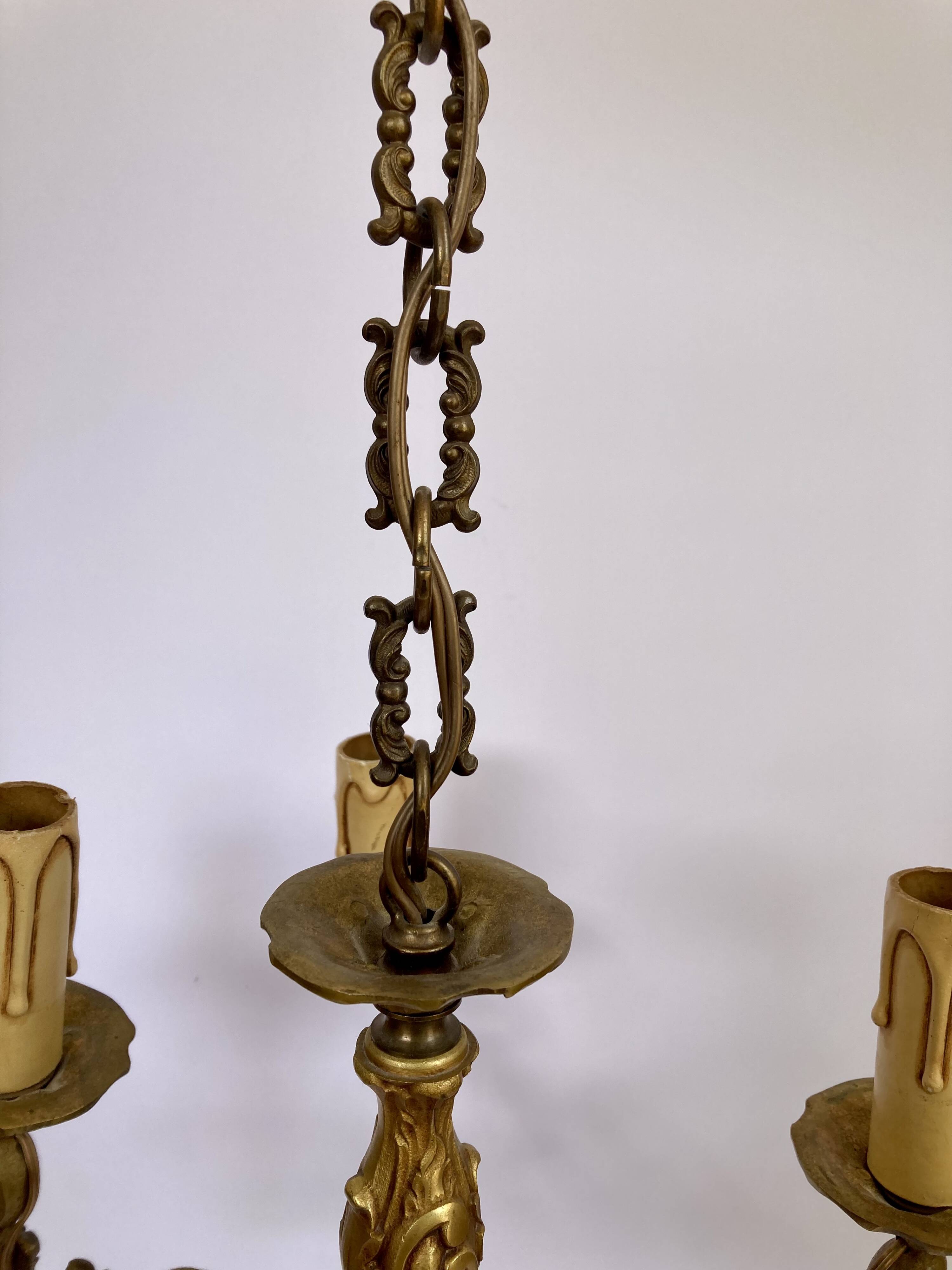 Lustre ancien doré à 5 lumières