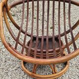 Rotating and rocking rattan armchair