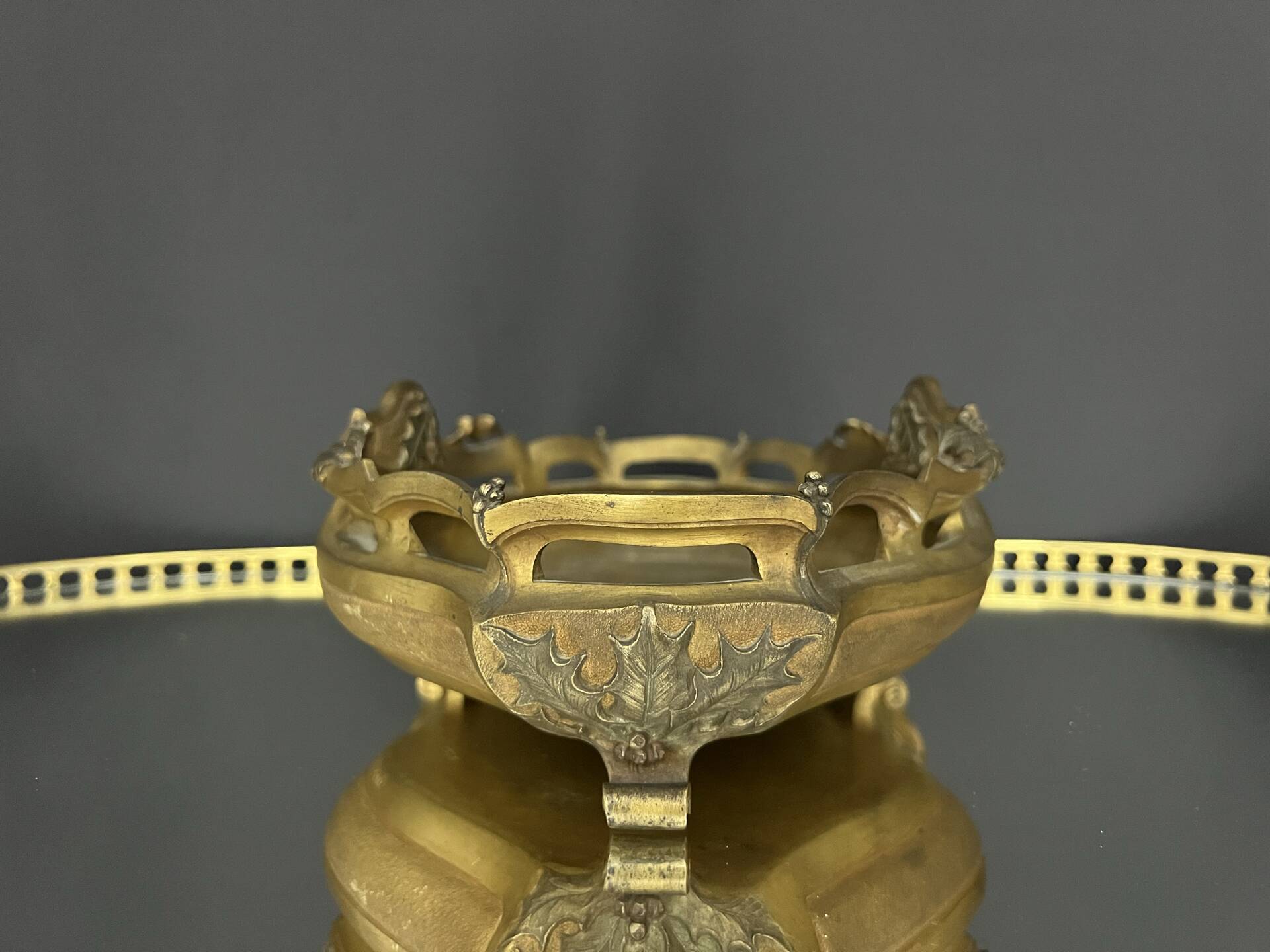 Art Nouveau jardinière in gilded bronze with holly decoration, signed E. Gros.
