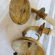 Electrified bronze gold wall sconces... in pairs.