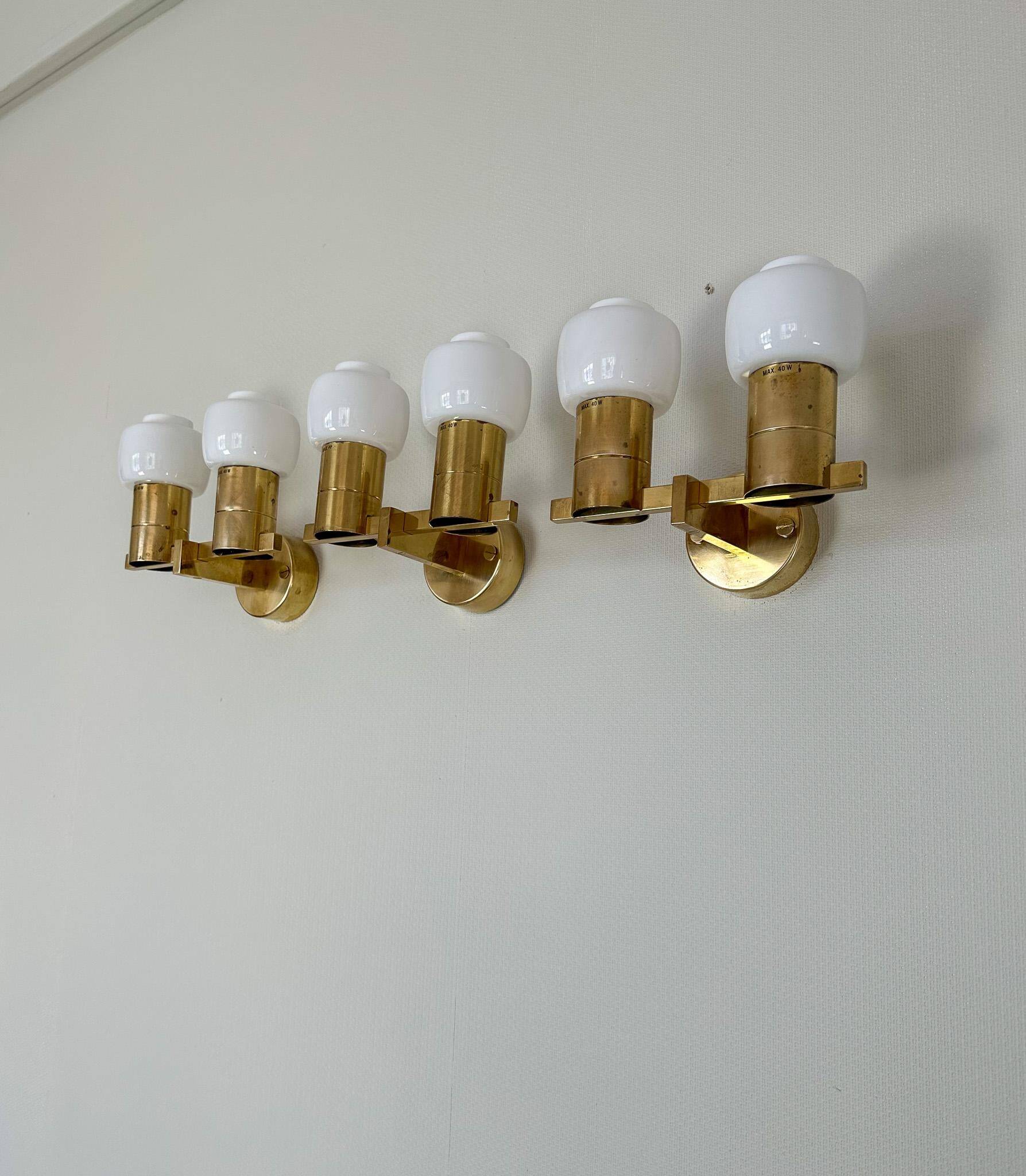 Brass and opaline glass wall lamps by Hans-Agne Jakobsson in mid-century style, Sweden, 1960s.