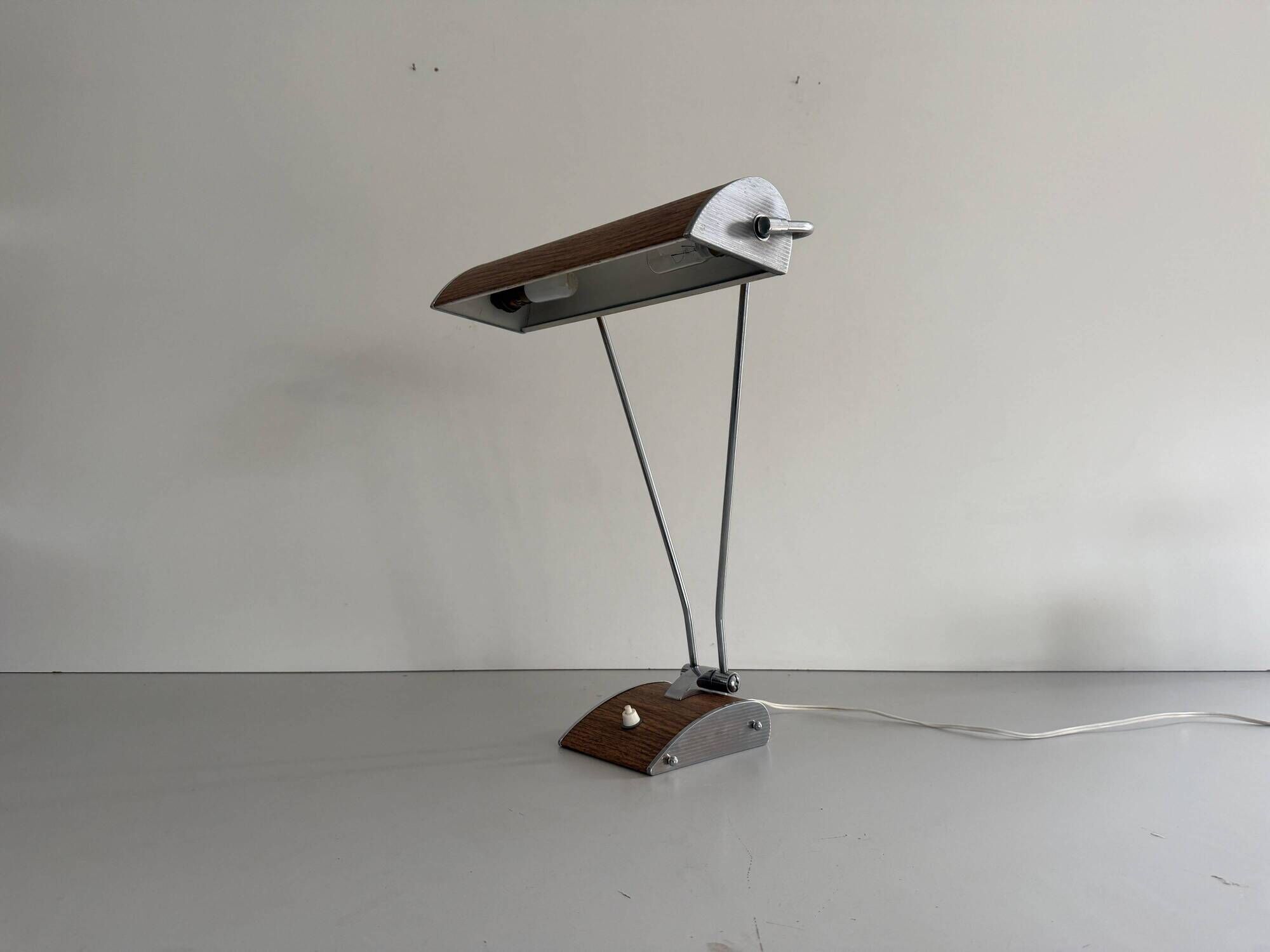 Large metal desk lamp with Wood Design texture by Eileen Gray, 1950s, France.