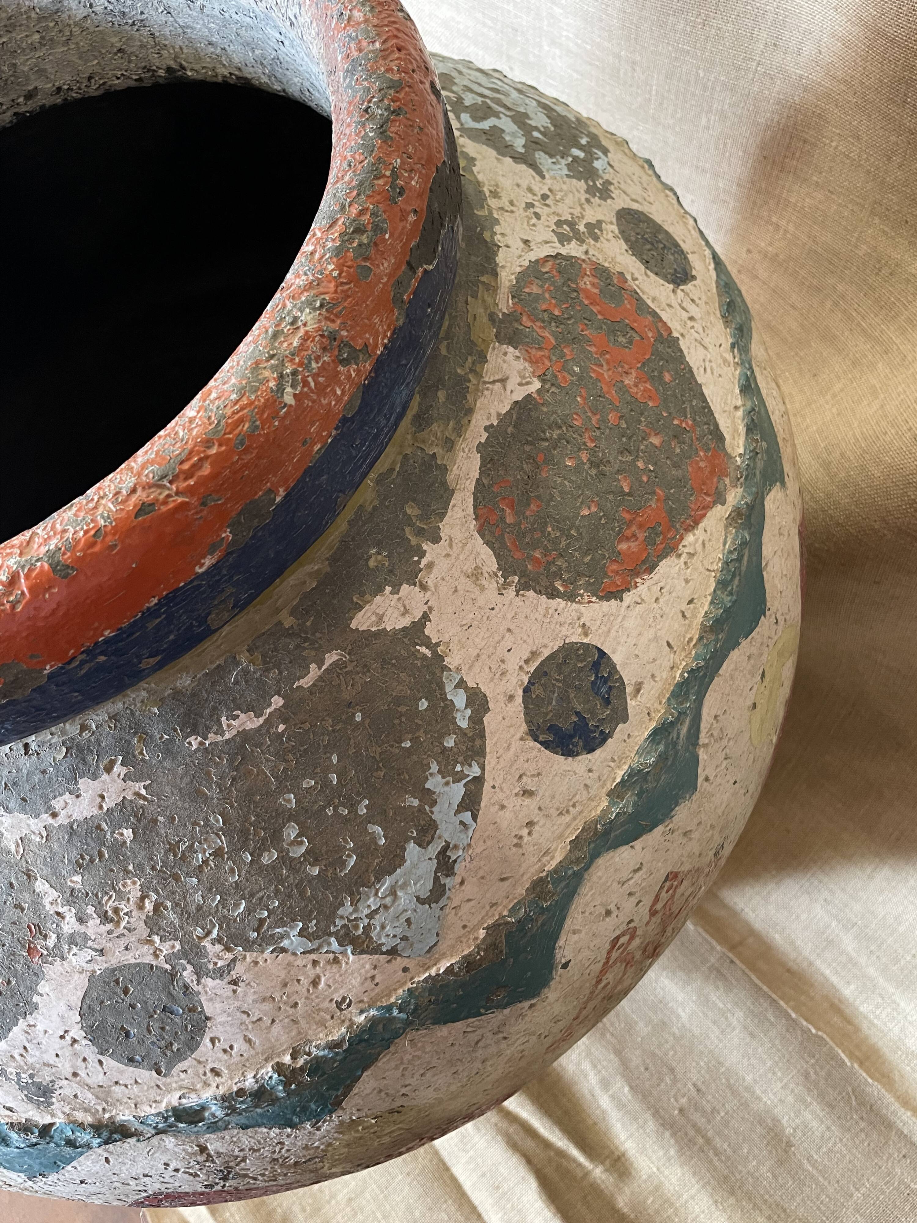 Polychrome decorated terracotta jar