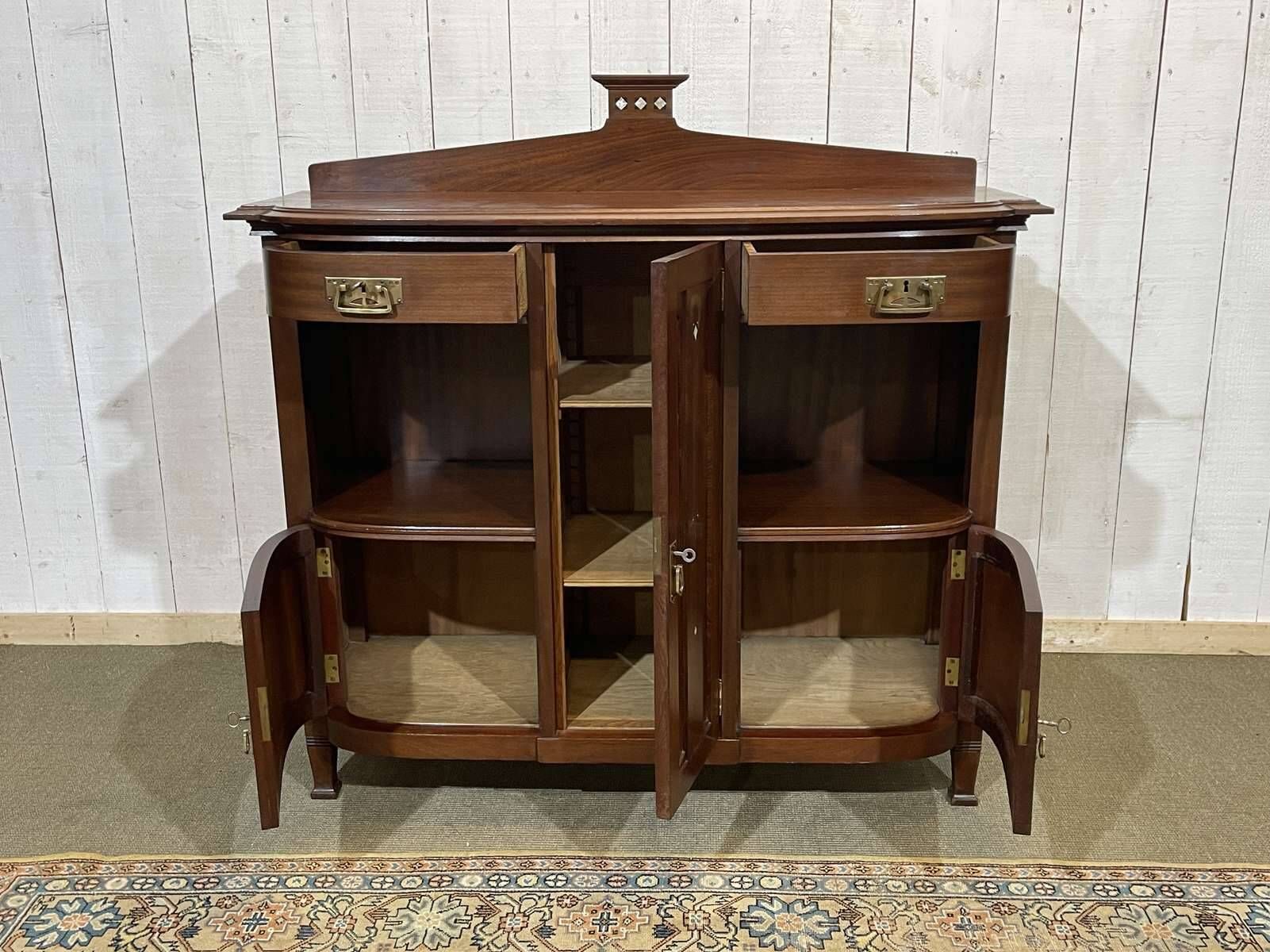 Mahogany sideboard from the Art Nouveau period in the style of Gustave Serrurier-Bovy.