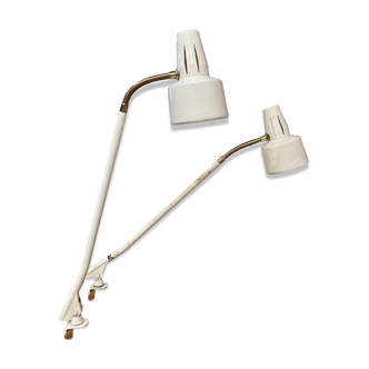 Pair of large modular industrial lamps from the 1950s.