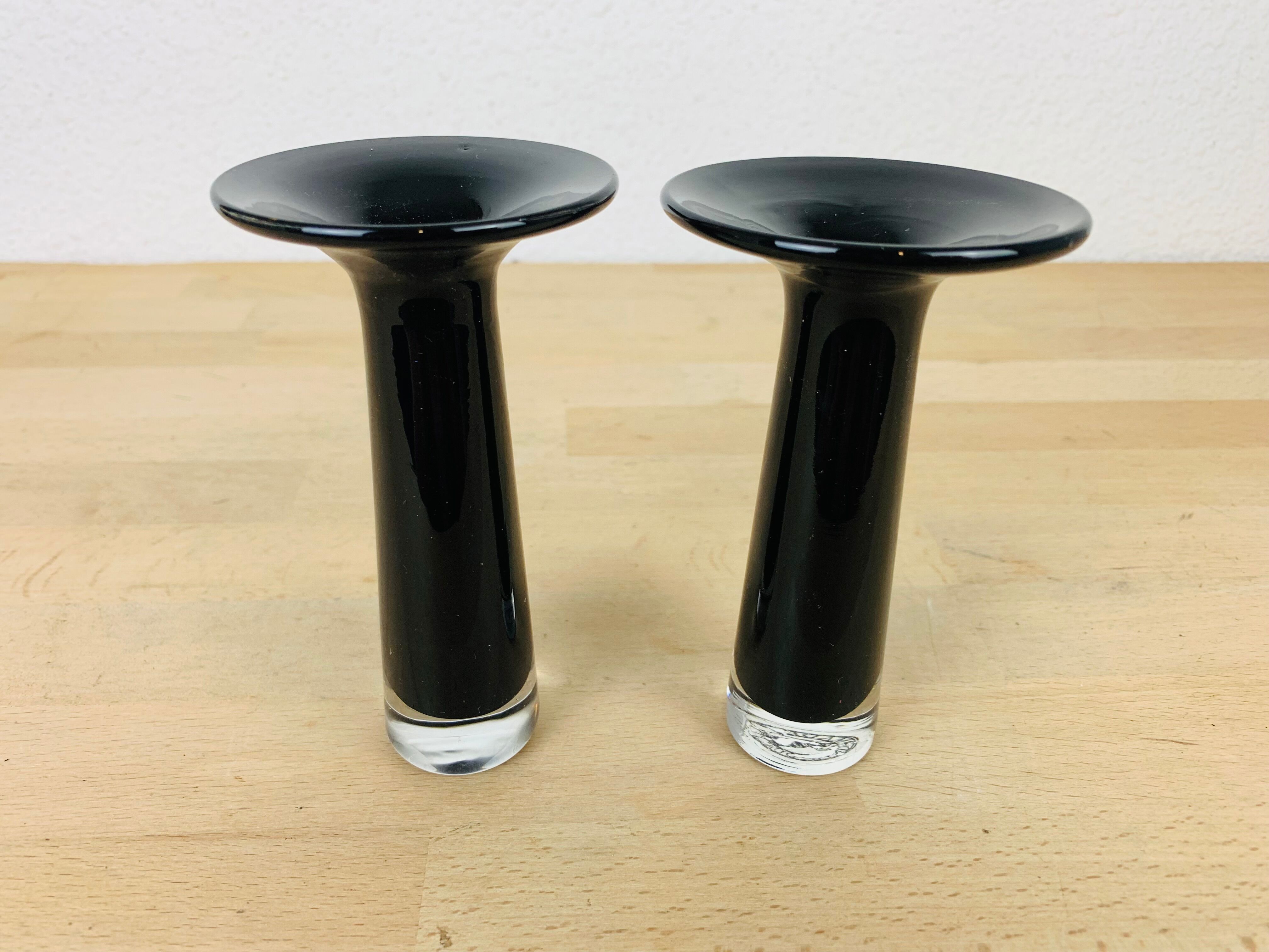 Pair of black blown glass candlesticks