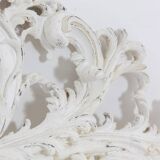 Rocaille style headboard, in carved and lacquered wood. Circa 1900.
