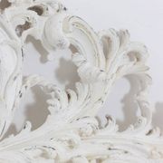 Rocaille style headboard, in carved and lacquered wood. Circa 1900.