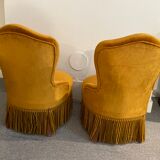 Deux fauteuils crapauds couleur moutarde