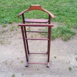 Chamber valet in mahogany tinted beech from the 70s with castors