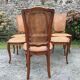 Vintage regency cherry chairs with canned backrests and seats