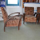 Pair of Art Deco armchairs in curved wood and multicoloured fabric from the 1920s.