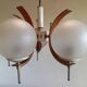 Scandinavian suspension in teak, glass, and metal.
