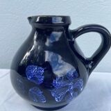 Blue ceramic pitcher